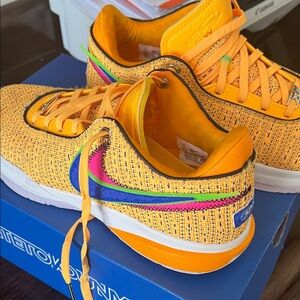 Nike Yellow Knit Low-Top Athletic Sneakers with Multicolor Swoosh
